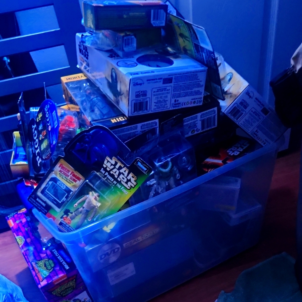 Box of brand new toys